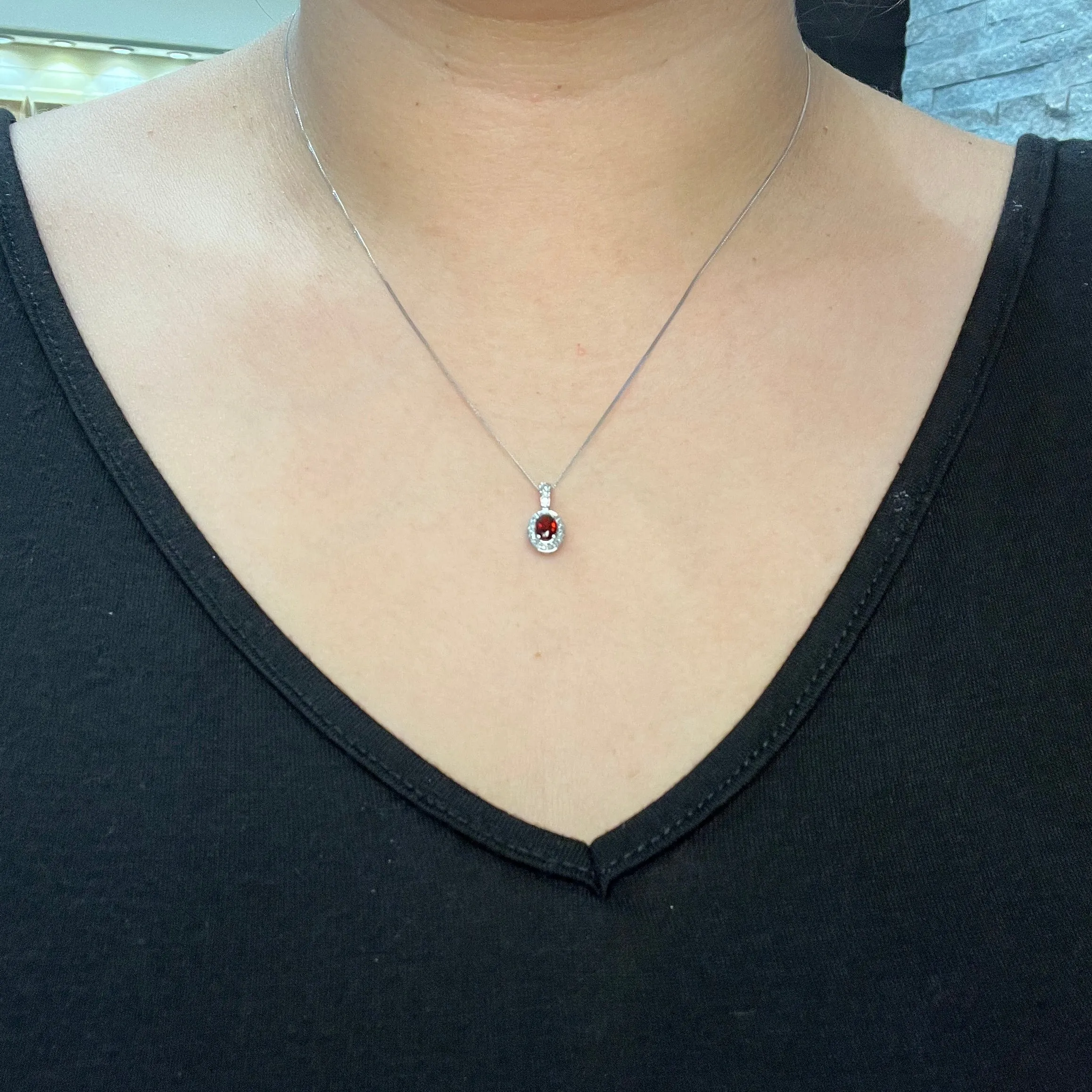 10K White Gold (May) Birthstone Emerald and Diamond Halo Pendant