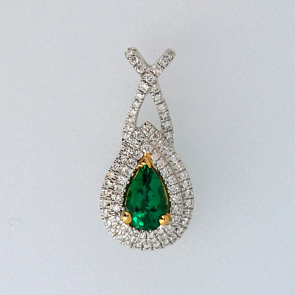 14k White Gold Pendant with a .31ct Emerald and .16ct diamonds