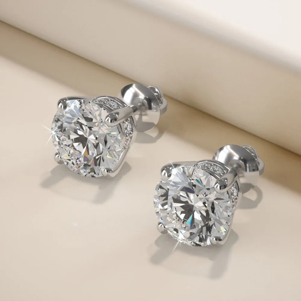 Brilliant Stud Earrings with Side Diamonds Diamond with 3.11 ct. (2X1.50 ct. center diamonds)