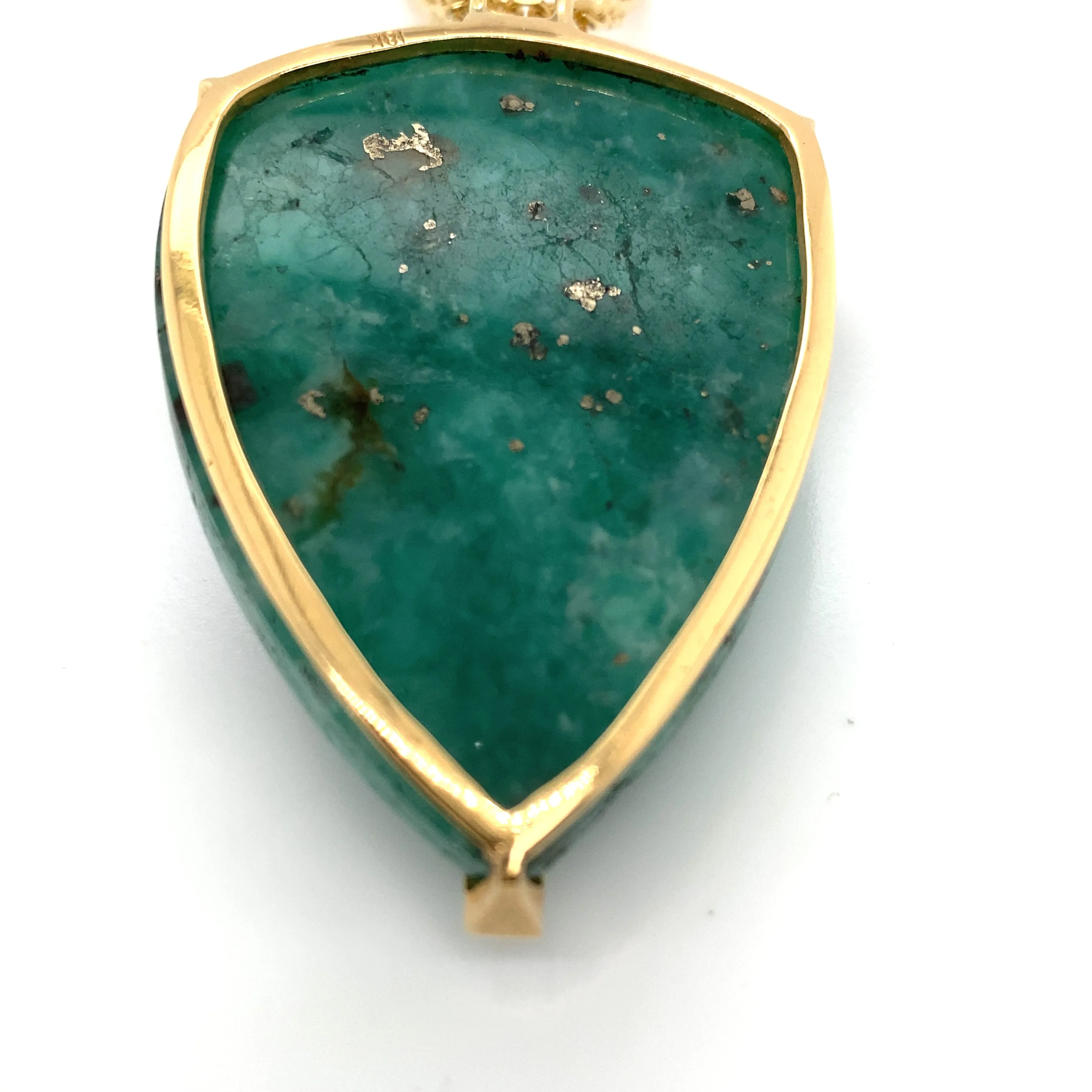 Carved Emerald Horsehead Pendant