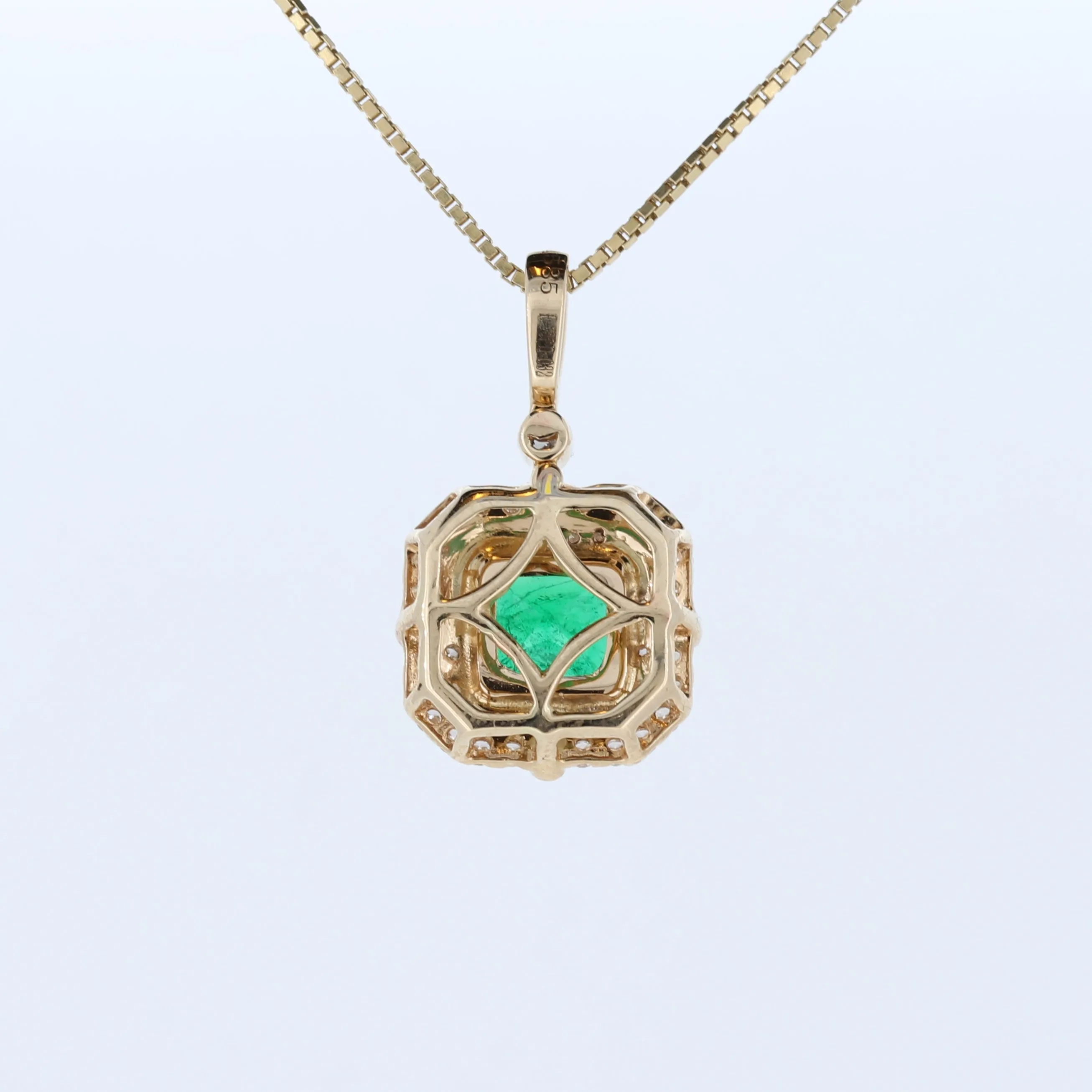 Cushion Emerald And Double Halo Diamond Pendant In 14Kt Yellow Gold
