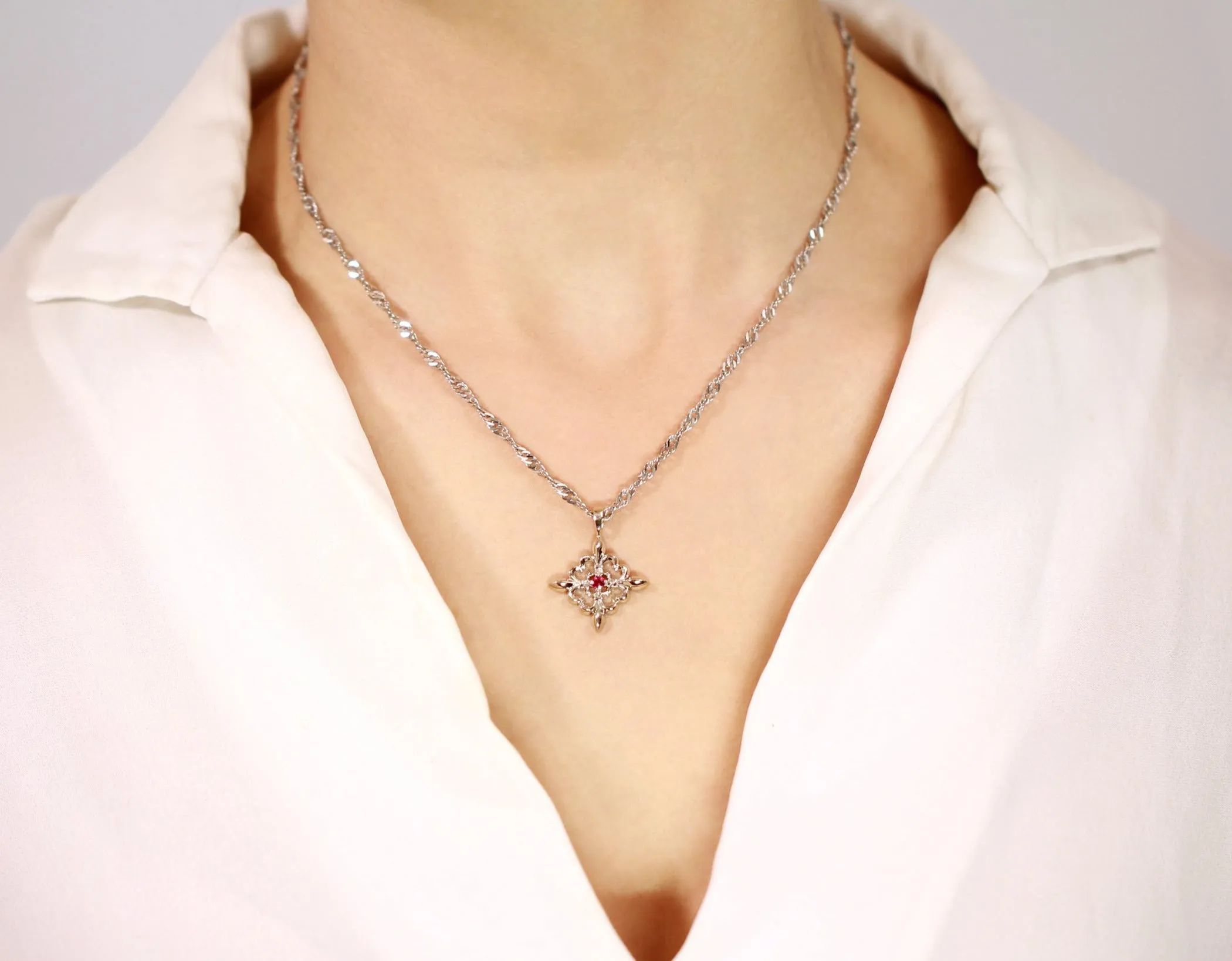 Fleur-de-lis Emerald Pendant