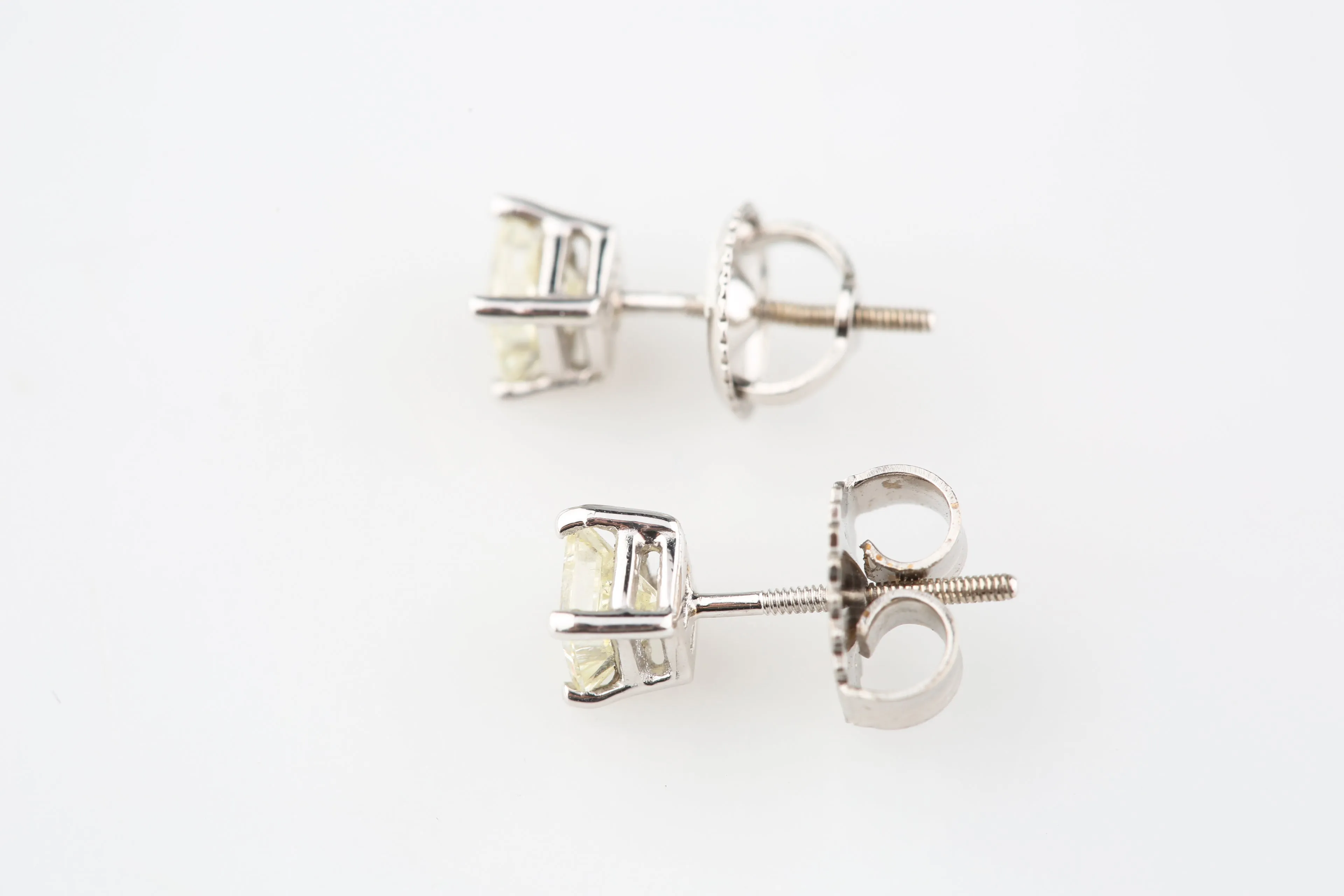 Gorgeous 0.69 TCW Princess Cut Stud Earrings in 14k White Gold with Screw Backs