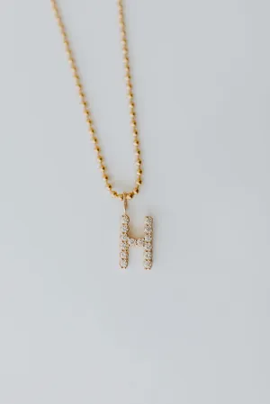 Large Initial Charms