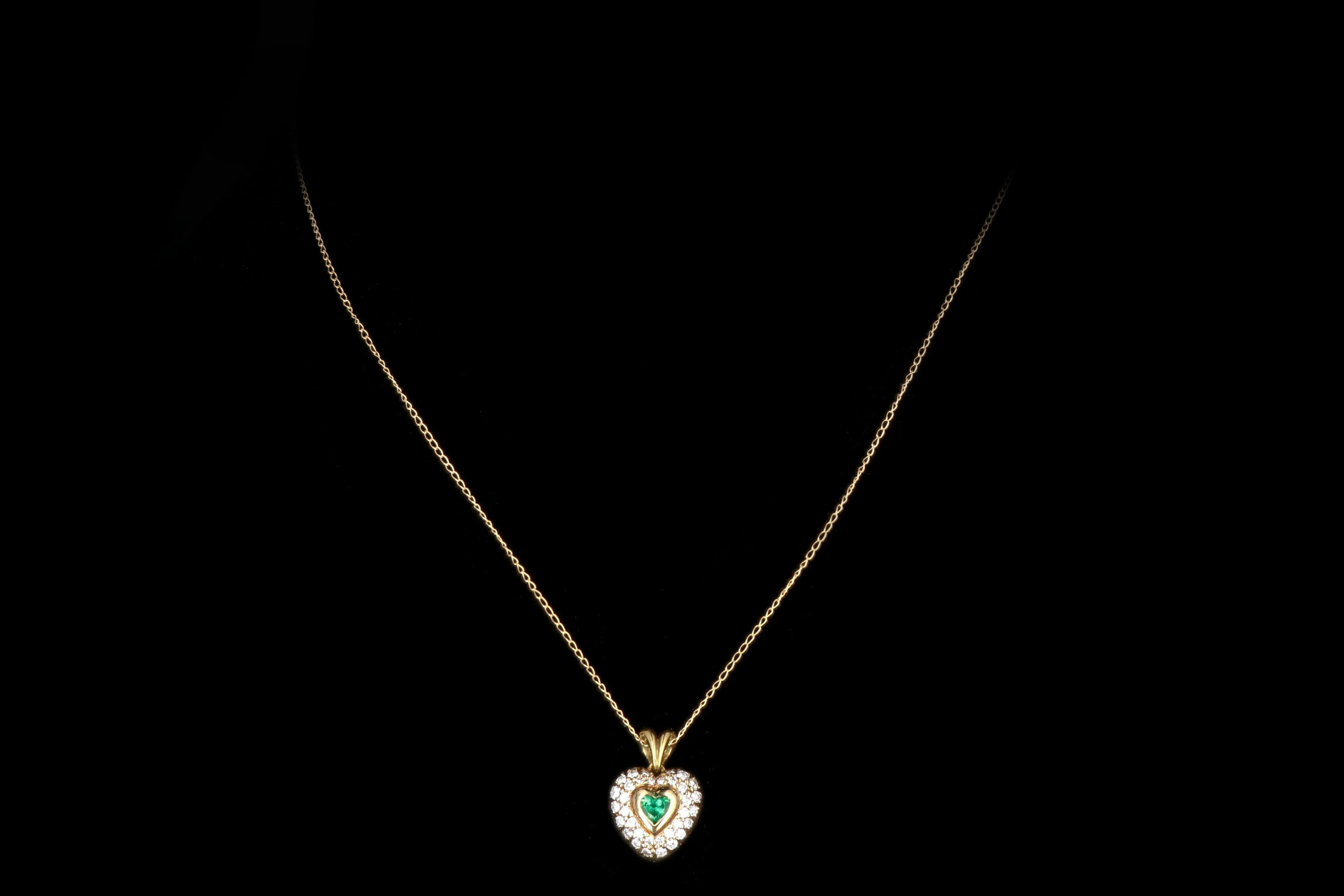 Modern 18K Yellow Gold .50 Carat Emerald and Diamond Heart