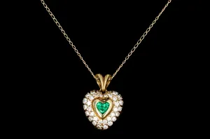 Modern 18K Yellow Gold .50 Carat Emerald and Diamond Heart