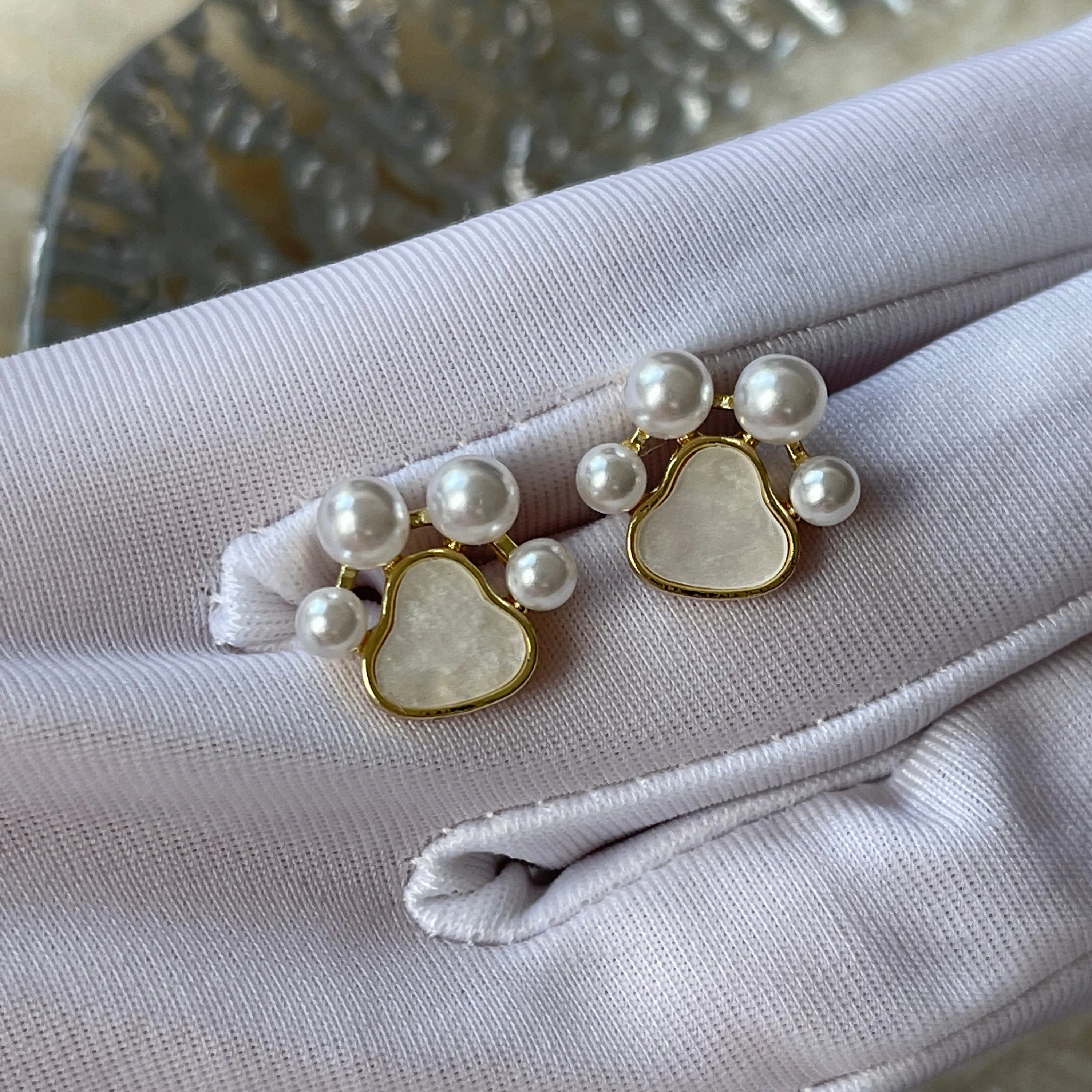 Pearl paw print earrings