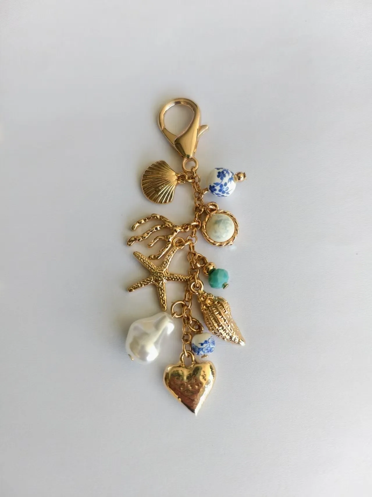 PORCELAIN SEA LIFE PEARL HEART TURQ BEAD BAG CHARM | 80K009