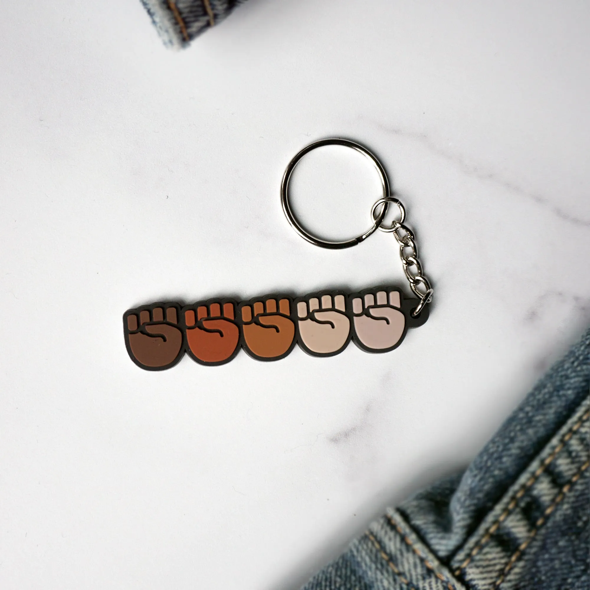 Stand Together Raised Fists Emoji Soft PVC Keychain | Black Lives Matter Charity Fundraiser