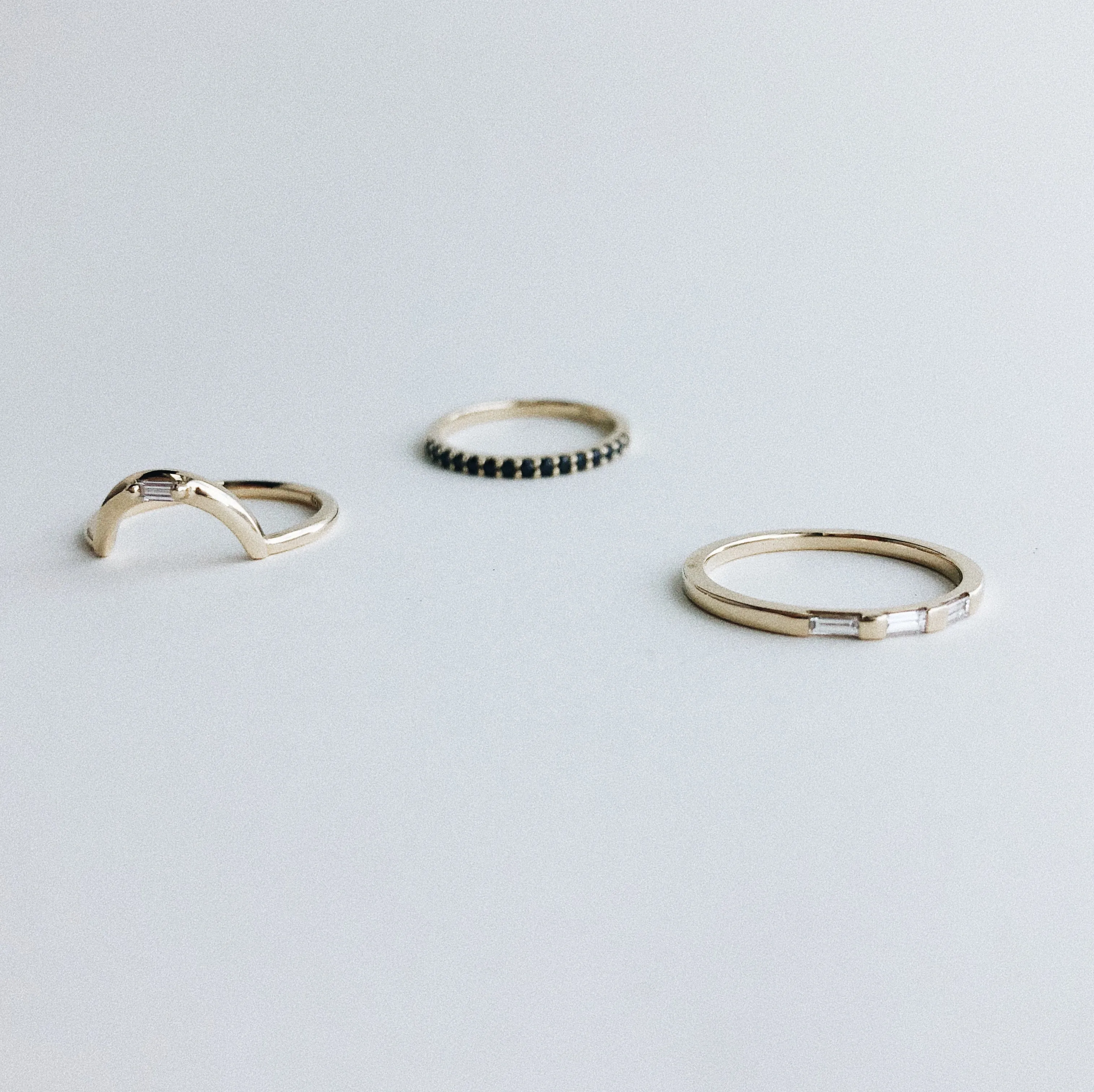White Baguette Diamond Arch Band in Yellow Gold