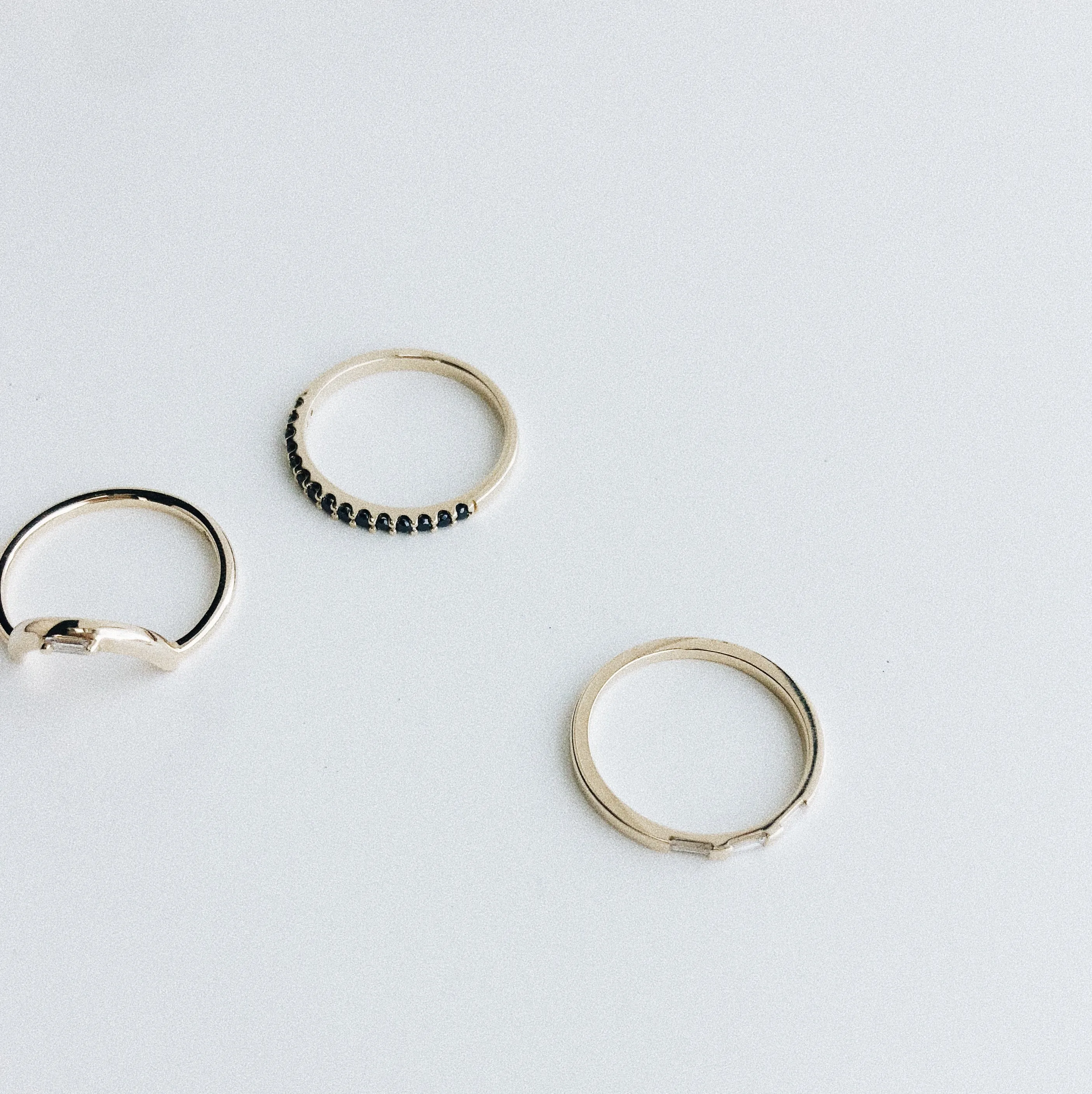 White Baguette Diamond Arch Band in Yellow Gold